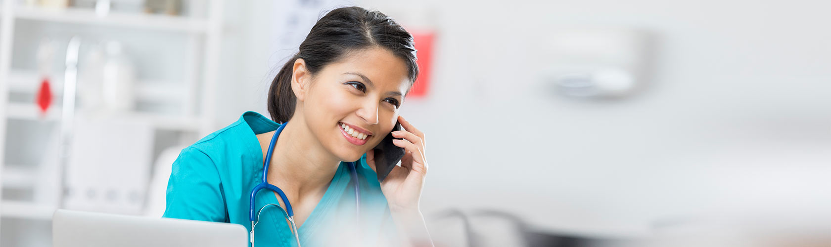 Medical professional speaking on phone