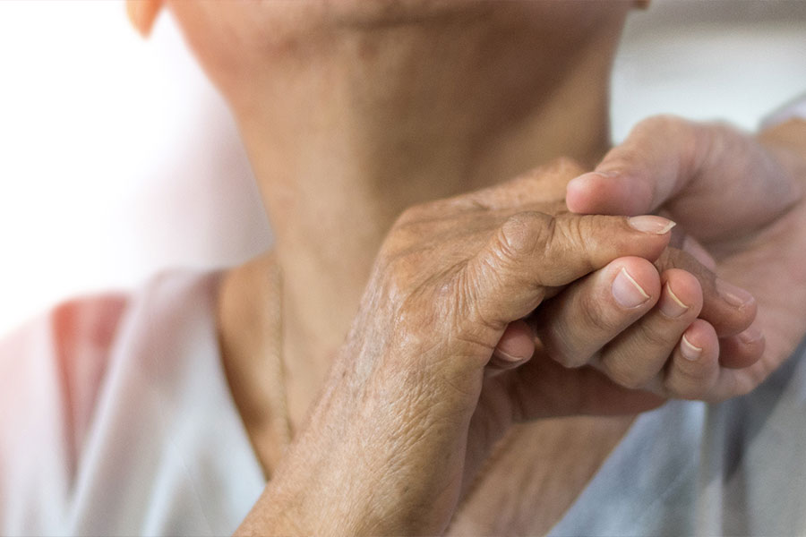 two people holding hands